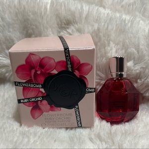 Flower bomb Ruby orchid miniature dab on great for traveling!